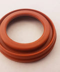 Bread Machine Gasket Seal Replacement Part For ABM600-1 ABM-600-1 Model, Easy Install, Durable fit, circular orange gasket on table.