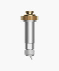 Front view of Cricut knife blade and drive housing; silver cylinder with gold knurled adjustment ring.