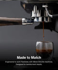 58mm Bottomless Naked Portafilter Straight Shooter Design For Breville Espresso Machines includes a wooden handle and brewing espresso.