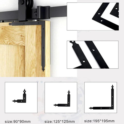 Set Of Four L Shape Corner Brackets In Carbon Steel With Black Anti Rust Coating For Sliding Barn Doors Functional And Decorative 90x90mm 125x125mm 195x195mm Sizes Ideal For Garage Doors Gates Shutters And Furniture shown in detail with wooden barn door.