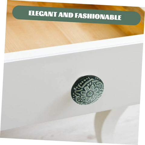 Set Of 10 Ceramic Drawer Pulls And Kitchen Cupboard Knobs With Vintage Pattern Single Hole Cabinet Door Handles For Dresser And Closet Hardware In Celadon Blue, shown on a white drawer.