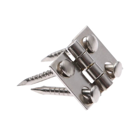 Close-up of Miniature Brass Hinges Set With 20 Pieces 1 x 0.8 Cm Folding Butt Hinges Plus 80 Replacement Nails for wooden boxes, silver