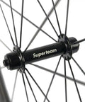 Close-up of R13 hub on Carbon Fiber Road Bike Wheelset 700c Clincher With 38mm Depth And 23mm Wide Rim, Toray T700, Basalt Braking Surface