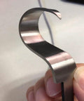 Close-up of the hook blade from the Premium Wood Carving Tools Kit Includes Hella Sharp Sloyd Knife, designed for fine detail work.
