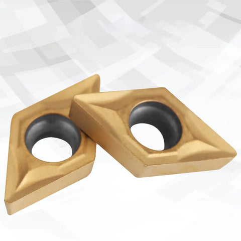 Close-up of two carbide tips from Carbide Tips Set For Lathe Turning Tools 10 Piece Boxed Set Pro Grade Heavy Duty.
