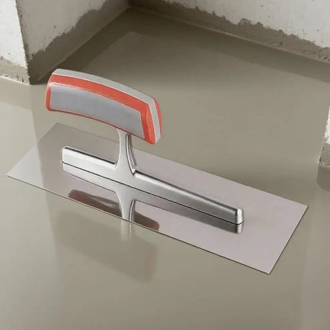 11.8x3.8 Inch Concrete Finishing Trowel With Premium Stainless Steel Blade on smooth masonry surface in corner