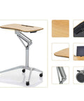 Hassle Free Pneumatic Sit Stand Laptop Desk Cart With Smooth Lever Adjustments Solid Rolling Ergonomic Mobile Workstation And No Fuss Stability For Home Office Study, height-adjustable with wood top and wheels.