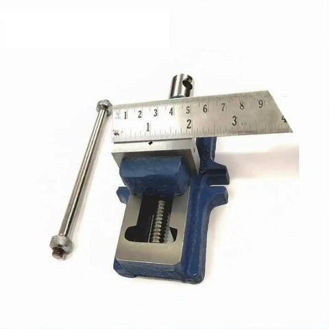 Heavy Duty Lathe Vertical Milling Slide With Tilt Swivel Base And Roomy 4 By 5 Inch Mounting Deck Built Like A Tank Out Of Solid Cast Iron Paired With A Rapid Action 2 Inch Self Centering Vise For Smooth Stock Removal Across The Local Machine Shop Floor