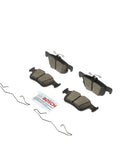Bosch BC1665 QuietCast ceramic rear brake pad set of four with mounting hardware and retention clips