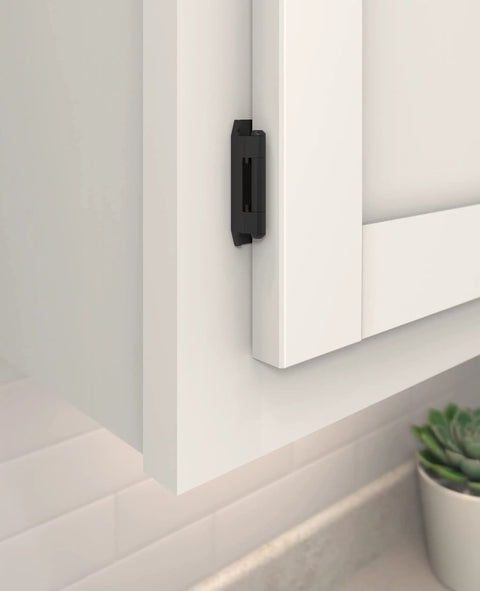 Close-up of Heavy Duty Steel Cabinet Hinges Matte Black For Face Frame Doors, fitted to white cabinet with half inch overlay.