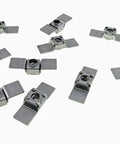 10 Pack 1/4-20 Weldable Floating Cage Nuts Heavy Duty Steel Fasteners For Forklifts and Rail Cars in a scattered arrangement.