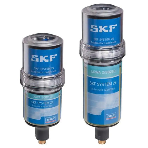 Automatic lubricators for industrial use, featuring SKF branding, showcasing two models in clear casing against a white background.