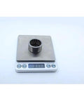 Built Tough One Way Needle Roller Bearing Drawn Cup Clutch 30x37x20mm 52100 Chrome Steel on digital scale showing weight.