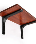 Heavy Duty L Brackets For Wall Shelves Rock Solid Corner Supports Built Tough With Safe Rounded Edges Handles Up To 35 Lbs Easily And Ships Complete With All Hardware For Zero Hassle Install, showcasing black metal brackets supporting a wooden shelf.
