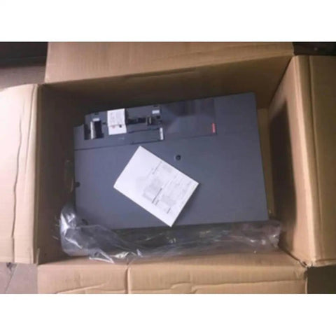 11kW Servo Drive For Precision Motion Control Systems - Rock-Solid Industrial Automation Controller With High Speed Positioning, Torque Control, And Robust, Heavy-Duty Performance For CNC, Robotics, And Manufacturing Lines. grey servo drive in cardboard box with manual