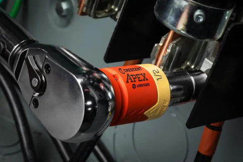 Close-up of Eshok Guard Half Inch Socket Isolator for Impact Wrenches connected to a tool, showcasing durability and fit.