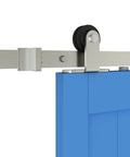Close-up of 6 Ft Beefy Brushed Nickel Sliding Barn Door Hardware Kit With Quiet Hanger Rollers And Flat Track installed on blue door