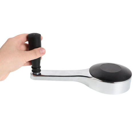 Heavy Duty L Shaped Hand Crank Wheel With Knob For Mobile Shelving Archives displayed with a hand gripping the black knob.