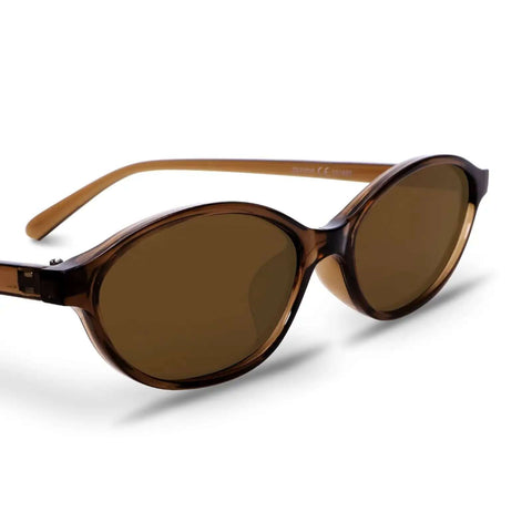 Retro Oval Sunglasses For Women With Cat Eye 90s Vibe Lightweight Narrow Frames UV Protection Sun Glasses in brown frame and lens