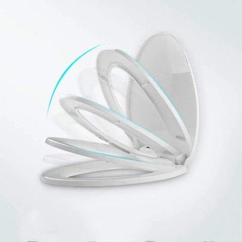 Slick Soft Close Oval Toilet Seat With Quick Release Hinges And Non Slip Base For Quiet Bathroom Upgrades Easy Wipe Down and Zero Slamming Nonsense, showing the unique hinge design.