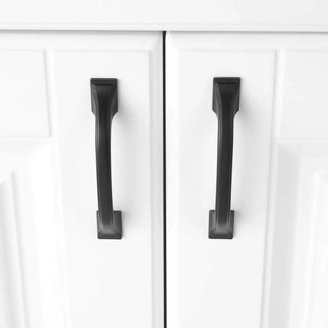 20 Pack 3 Inch Matte Black Kitchen Cabinet Pulls No Fuss Easy Install Solid Metal Handles for cabinets shown on white doors
