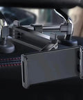 Heavy Duty Car Headrest Tablet Mount For Tesla Cybertruck featuring adjustable steel bracket secured tightly on car headrest.