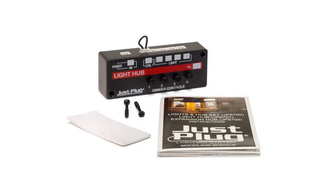 Just Plug Lighting System Kit With Light Hub, Expansion Hub, And Power Supply Plus Spice Of Life Tweezers, showing components and manual
