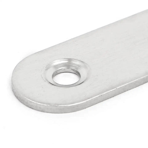 Close-up of Heavy Duty Stainless Steel Mending Plate showing hole for fastening, 2.4 x 0.6 inch, used for wood repair.