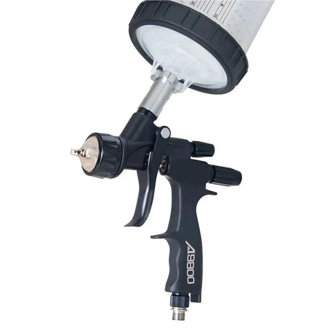 Pro Setup 1.3Mm Pneumatic Spray Gun For Rolling Out Dope Automotive Topcoats And Heavy Duty Furniture Varnish With A Slick Water Based Green Primer Finish, close-up view of nozzle and trigger.