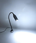 Magnetic LED Work Light 15W 1200LM with flexible gooseneck and base illuminating surface, ideal for lathe workbench garage lighting.