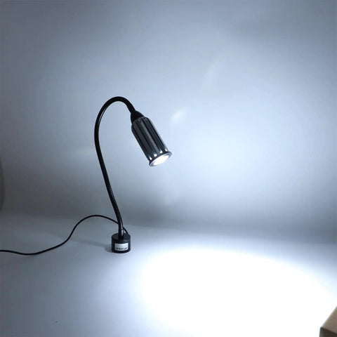 Magnetic LED Work Light 15W 1200LM with flexible gooseneck and base illuminating surface, ideal for lathe workbench garage lighting.