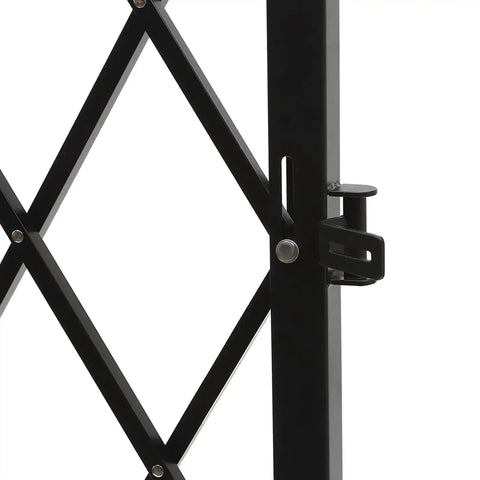 Close-up of Heavy Duty Folding Security Gate with Lockable Diamond Grid Panels showing black steel frame and locking mechanism.
