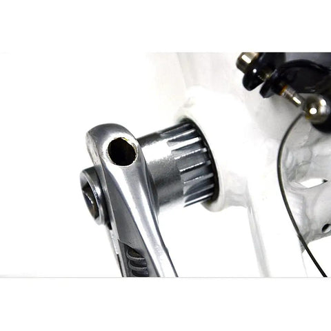 Heavy Duty Bike Bottom Bracket Removal Tool for Twenty Tooth Cartridges in use with a half inch drive wrench on a bicycle frame