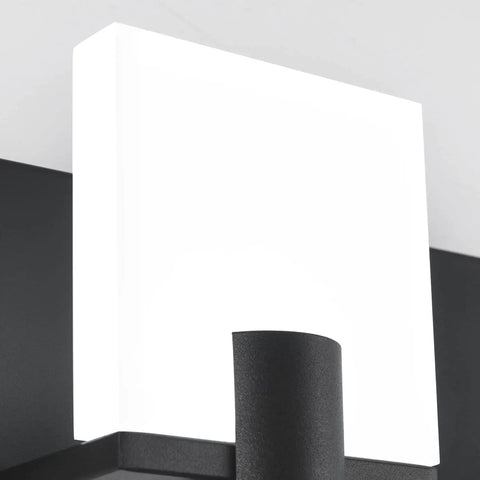 Close-up of white acrylic shade and matte black back plate on Slick Black LED Vanity Light 4 Light Modern Bath Fixtures Above Mirror Dimmable Wall Mount Matte Black Back Plate With White Acrylic Shade 34.7 Inch Length Energy Saving 40W LED Lighting.