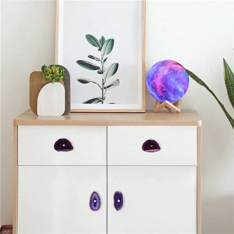 Top Tier Agate Cabinet Drawer Knobs With Stunning Gold Plated Edges on modern dresser, showcasing elegant agate and gold trim.