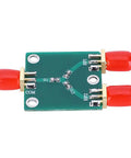 Top Shelf Slick 2 Way Rf Power Divider Module Dc To 5Ghz Broadband Signal Splitter on green PCB with red connectors.