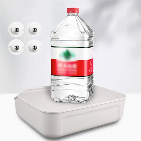 Four Pack Universal Self Adhesive Ball Casters For Heavy Storage Bins And Plastic Tubs Silent Swivel furniture glides beside water bottle on organizer.