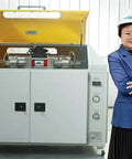 Water jet cutting machine, front view with yellow lid open and visible control panel.