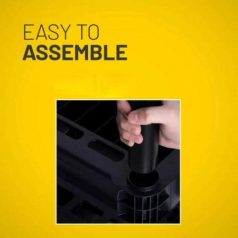Person assembling the Heavy Duty Four Tier Plastic Storage Shelf Rack In Black 48 X 21 X 14 Inches with ease.
