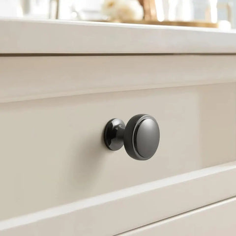 Polished black cabinet knob installed on drawer, Six Pack Dope Polished Black 1.1 Inch Round Cabinet Knobs Solid Zinc Alloy Drawer Pulls In Dark Grey Gunmetal Finish
