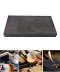 High Purity 99.9 Percent Carbon Graphite Plate, 30mm x 20mm x 2mm, shown in use for metallurgy and lab applications.