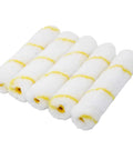 Pro Grade 6 Inch Mini Paint Roller Covers 1/2 Inch Nap Nylon Pack Of 50 displayed in a row for smooth wall and trim finish