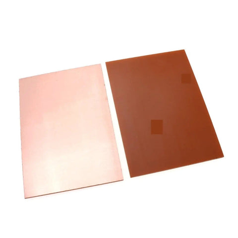 Two single-sided FR4 copper-clad laminate PCB boards, 7x10cm, showcasing excellent flatness for DIY prototyping.