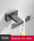 Heavy Duty Stainless Steel Wall Hook Knockout Rust Proof Design Slick Easy Install To Hang Robes Towels Jackets And Bags Right In The Bathroom Or Kitchen Today, shown with a bath brush.