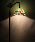 Tiffany Style Floor Lamp With Dope Stained Glass Shade In Red And Green Floral Arched Gooseneck Reading Light Bronze Base Tall 66 Inch Arc UL Certified Foot Switch, lit in dim room