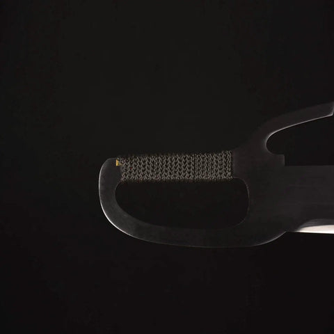 Close-up of the rope wrapped grip of Wing Chun Training Double Fork Knife For Sparring, Southern Style Short Practice Sword.