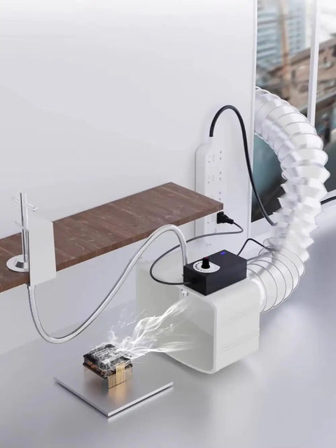 No Sweat Desktop Smoke Absorber For Soldering Tasks with exhaust hose pulling fumes from PCB workstation.
