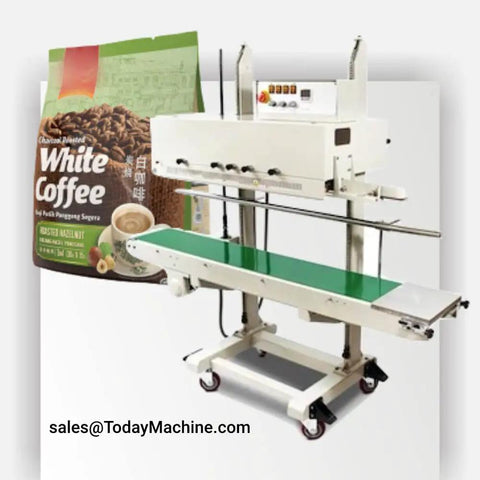Automatic Vacuum Tray Sealer And Solid Workhorse Professional Sealing Unit With Smooth Conveyor Belt For Plug And Play Food Packaging And Quick Daily Seal Runs Every Single Day with a green conveyor belt and coffee bag.