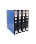 Four Badass 3.2V 50Ah LFP Cell Batteries lined up, designed for home energy storage and electric vehicle builds.