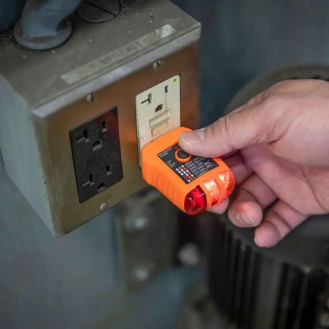 Person using RT210 Outlet Tester For GFCI And Standard Receptacles Easy Electrical Safety Check For Homeowners on wall outlet